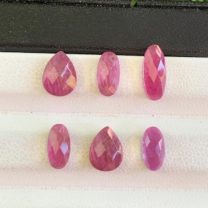 May include: A white ceramic mug with a black handle and the text "But First, Coffee" in a black, bold font. The mug is on a white surface. The mug is 4 inches tall.