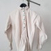 see more listings in the Blouses / Tops section