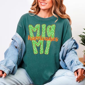 Miami Hurricanes Gameday Tee, Miami Tailgate, The U is Back Comfort Colors Tee, Canes By Forty Graphic Tee, Miami Hurricanes Comfort Colors