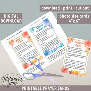 May include: Printable prayer cards featuring a watercolor floral design with the text "Regina Caeli" in a gold font. The cards are 4 inches by 6 inches and are perfect for personal use or to share with others.