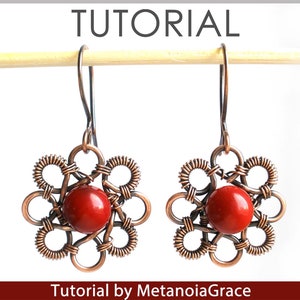 K&ouml;nnte beinhalten: Ein Paar Ohrringe aus Kupferdraht mit roten Edelsteinperlen in der Mitte jedes Ohrrings. Die Ohrringe h&auml;ngen an einem Holzstab. Der Text "Tutorial by MetanoiaGrace" befindet sich am unteren Rand des Bildes.