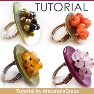 May include: Four different rings with a button-like base and a cluster of colorful beads on top. The rings are made with copper wire and have a variety of colors, including green, orange, pink, and white.
