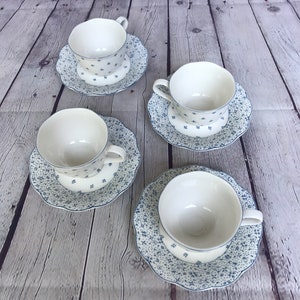 Coffee and or tea cups and saucers. Set of 4