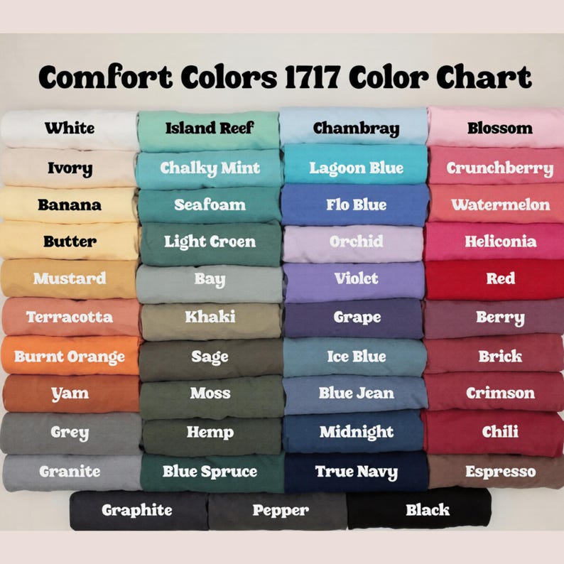May include: A color chart titled "Comfort Colors 1717 Color Chart" displays a variety of fabric colors. The chart includes shades like white, ivory, banana, butter, mustard, terracotta, burnt orange, yam, grey, and granite.
