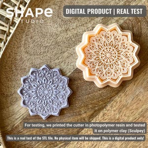 May include: Two mandala-shaped cutters, one gray and one peach-colored, are displayed on a wooden surface. The cutters have intricate floral patterns. The image includes text that reads "DIGITAL PRODUCT | REAL TEST" and "SHAPE STUDIO".