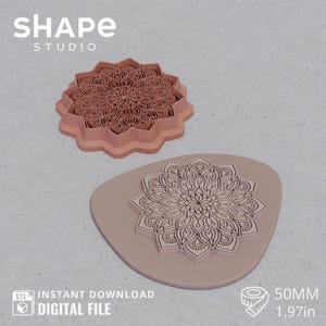 May include: Two pink mandala-shaped cookie cutters and a matching stamp. The stamp is on a light pink oval base. The text "SHAPE STUDIO" is at the top. The text "STL INSTANT DOWNLOAD DIGITAL FILE" is at the bottom. The size is 1.97in (50mm).