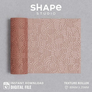 May include: A pink textured roller with a repeating pattern of curved lines. The roller is 80mm x 25mm and is labeled "Texture Roller".