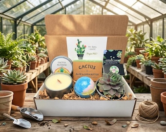 May include: A gift box containing a Cactus Blossom candle in a tin, a rectangular Cactus Aloe & Shea Butter soap, a round multi-colored bath bomb, and a small succulent plant. A card reads I'm Sorry, I SUCC. Forgive ME? with a cactus illustration.