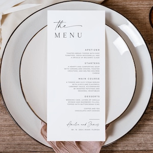 A modern wedding menu template placed on a sophisticated white plate setting, with elegant typography listing courses from appetizers to desserts, ideal for both casual and formal wedding celebrations.