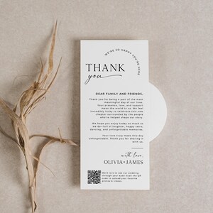 Custom thank you card flat lay featuring a wedding thank you template with a QR code for guests to upload memories. A printable thank you note that's editable in Canva, ideal for weddings and receptions. Includes a heartfelt message that serves as a personalized wedding thank you card and gift. Perfect for placing on dinner plates or table settings as a thank you notes wedding keepsake.