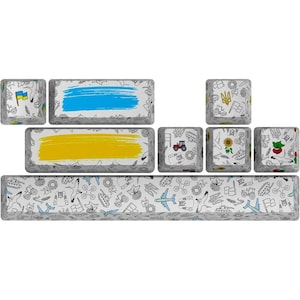 Peut inclure: Un ensemble de touches de clavier avec un design de drapeau ukrainien. Les touches sont blanches avec des contours noirs et présentent divers symboles, notamment un tournesol, un tracteur, un avion et un char. Les touches sont disposées en rangée avec une touche plus grande au centre.