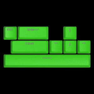 May include: A green keyboard with the keys labelled "Esc", "Enter", "Shift", and arrow keys. The keyboard has a green space bar.