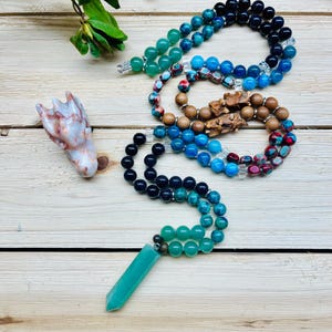 Transformation’s Call Mala Necklace - Blue Apatite, Adventurine, Blue Goldstone, Quartz, Sandalwood & Snake Vertebrae