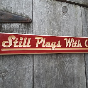 Still Plays With Cars Routed Carved Engraved Red or Black with natural lettering. Mechanic Gift Car Gift Garage Gift