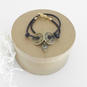 A Gypsy-Styled Black Leather Wrap Bracelet, the Prefect Gift for Your Free-Spirited Teen.