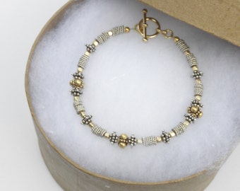 This Unique Bracelet of Beaded Gold-Filled and Sterling Silver Beads is Simply Smashing.