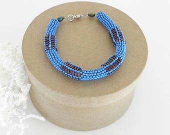 Handmade Beaded Bracelet: Sky Blue Seed Beads, Purple Accents