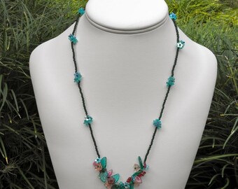 An Enchanting and Playful Handmade Garden Necklace by SeedlingDesigns