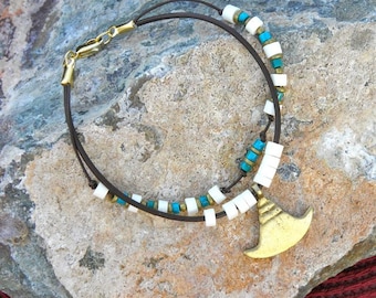 A Handmade Beaded Leather Bracelet  Bone, Brass, Turquoise and a Flat Axe Pendant