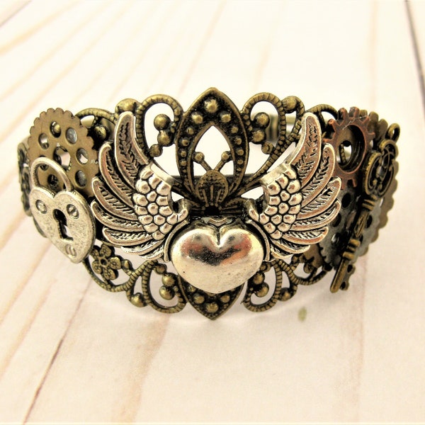 Steampunk Bracelet Cuff with Gears and Heart and Wings, Steampunk Charms on Brass  Filigree Bracelet Cuff, Handmade Jewelry