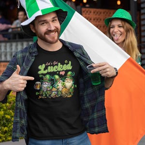 聖パトリックデーのラッキーレプラコーンユニセックスTシャツ、ビールシャムロック金貨アイルランドセレブレーションシャツ、幸運をつかもう