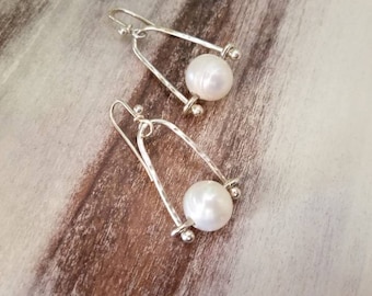 Large pearl earrings