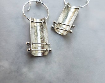 Barrio earrings, riveted pierced barbell