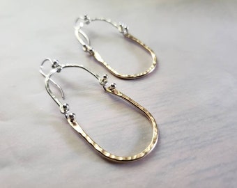 Gold and sterling U drop earrings