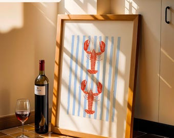 May include: A framed art print featuring two red lobsters on a light blue and white striped background. A bottle of red wine and a wine glass are in the foreground. The text "INSTANT DIGITAL DOWNLOAD" is in the upper left corner.