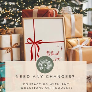 May include: A framed print with a red ribbon design and the text "It's the most..." is surrounded by wrapped gifts with bows. The gifts are in various colors, including gold, white, and red, with a Christmas tree in the background.
