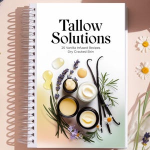 May include: A white spiral bound notebook with the title "Tallow Solutions" and the text "25 Vanilla Infused Recipes Dry Cracked Skin". The cover features a flat lay of vanilla beans, lavender flowers, and jars of cream.