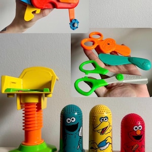 May include: A selection of colourful Sesame Street toys. Includes a multi-tool, scissors, a chair, and three thimbles featuring Cookie Monster, Big Bird, and Elmo. The toys are made of plastic and are brightly coloured.