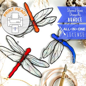 May include: Three stained glass dragonfly designs in red, orange, and blue, with white and iridescent wings. The image includes a "Print Ready" icon and text that reads "Stained Glass Dragonfly Bundle" and "All in One License."