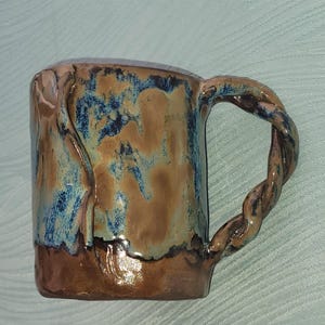 Twisted handle mug