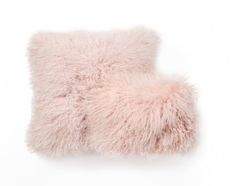 blush fur pillow