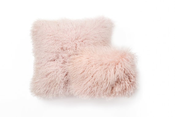 blush fluffy cushions