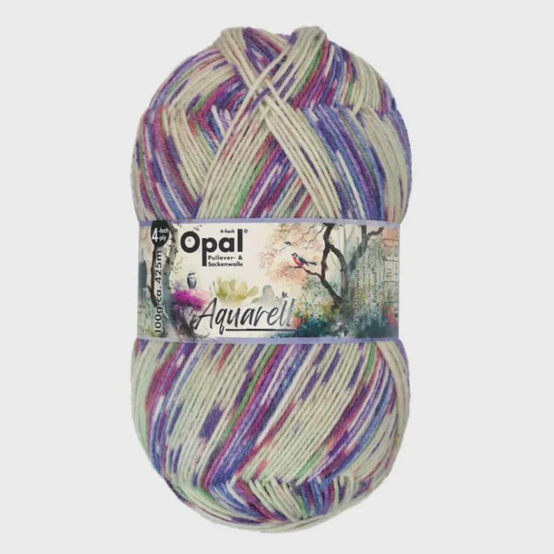 May include: A ball of Opal Aquarell yarn in cream, purple, green, and pink. The label features the Opal logo and the word "Aquarell". The yarn is 100g and approximately 425m.