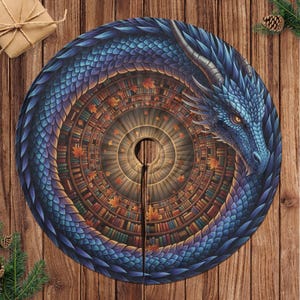 May include: A round Christmas tree skirt featuring a blue dragon with a detailed scale pattern. The dragon is wrapped around a circular design of bookshelves and autumn leaves. The skirt has a slit for the tree trunk and is set against a wooden background.