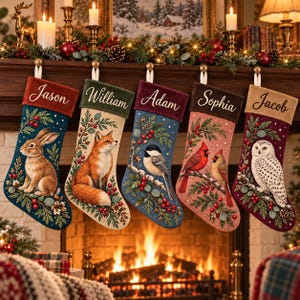 May include: Five Christmas stockings hanging in a row, each featuring a unique animal illustration: a rabbit, fox, chickadee, cardinal, and snowy owl. Each stocking has a velvet cuff embroidered with the names Jason, William, Adam, Sophia, and Jacob.