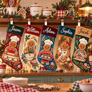 May include: Five personalized Christmas stockings hanging in a row. Each features a gingerbread character, festive greenery, and a name embroidered on the cuff: Jason, William, Adam, Sophia, and Jacob. The stockings are red, cream, blue, tan, and green.