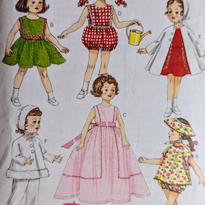 May include: A vintage sewing pattern for making doll clothes. The pattern is for a doll dress, a doll coat, a doll skirt, a doll top, and a doll hat. The pattern is from Butterick and is labeled 'Retro '56'.