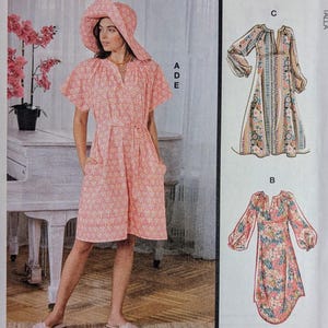 May include: McCall's sewing pattern featuring a pink floral print dress and matching hat. The pattern includes multiple view options with simple instructions. Size Y (XS-S-M).