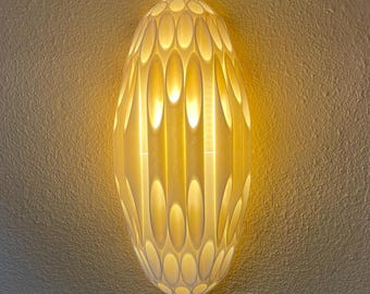 Arandela de parede OVOID Statement Piece com plugue: Inspirada no estilo moderno de meados do século de Rougier, uma luminária de parede exclusiva para sua casa.