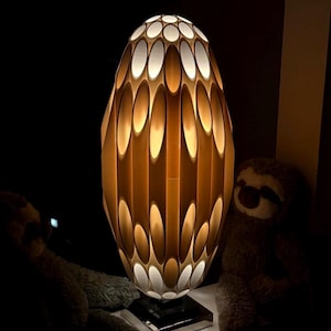 OVOID Mid-Century Statement Piece Lamp, Functional Art and Conversation Piece providing Ambient Light with selectable bulb in Rougier Style