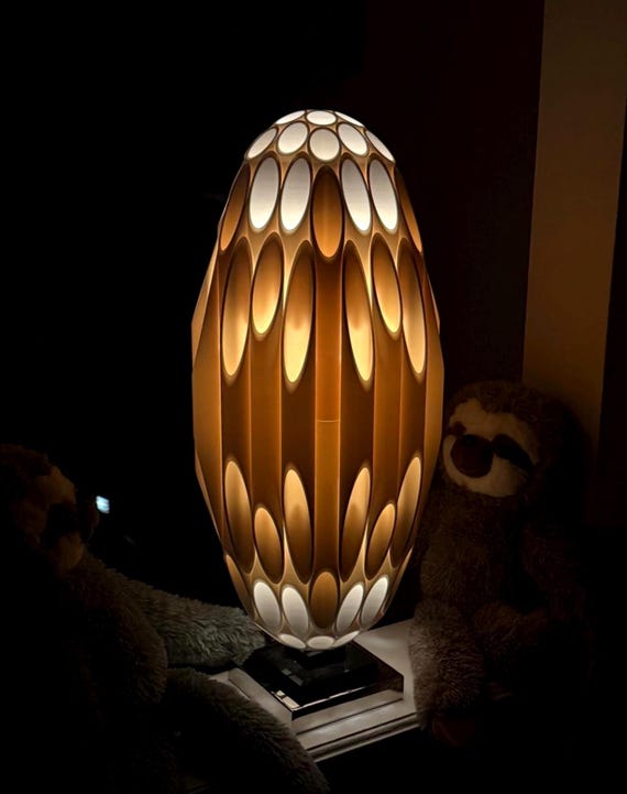 OVOID Mid-Century Statement Piece Lamp, Functional Art and Conversation Piece providing Ambient Light with selectable bulb in Rougier Style