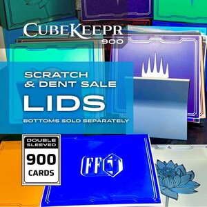 May include: A collection of CubeKeeper 900 card storage lids in various colors including blue, green, orange, and purple. The lids feature graphic designs like a lotus flower and a crown. Text includes CubeKeeper 900, Scratch & Dent Sale, Lids, Bottoms Sold Separately, and Double Sleeved 900 Cards.