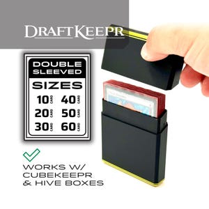 May include: A black rectangular card storage box labeled DraftKeeper with a removable lid. The box holds a stack of double-sleeved cards. Text on the image lists sizes for 10, 20, 30, 40, 50, and 60 cards and states it works with CubeKeeper and Hive boxes.