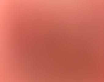 Pode incluir: Um fundo sólido, liso e uniforme de cor rosa coral.