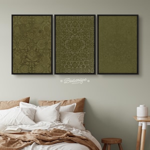 May include: Three framed prints of green patterned designs. The prints are hung on a light green wall above a bed with white bedding and brown throw pillows.