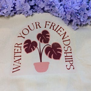 Canvas Tote with Floral Design, &#39;Water Your Friendships&#39; Botanical Bag for Unique Gift Giving